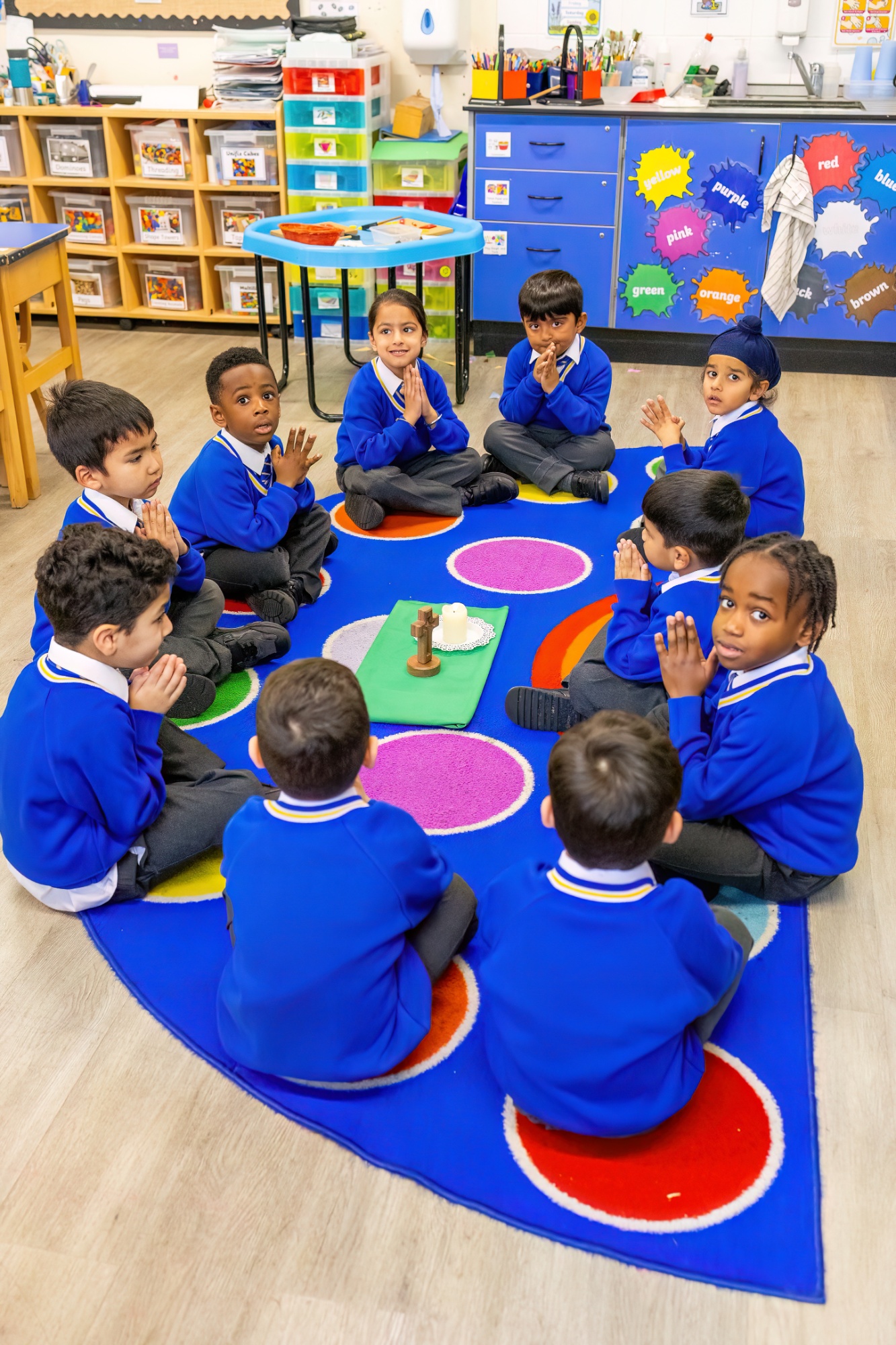 Loyola boys praying in classroom