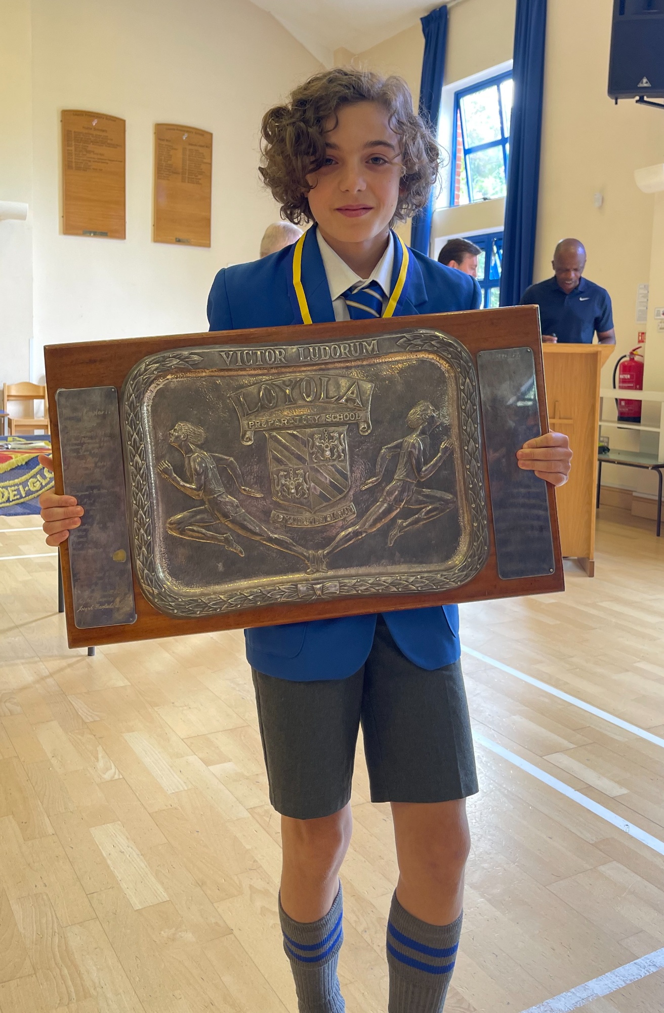 Loyola boy winning sports award